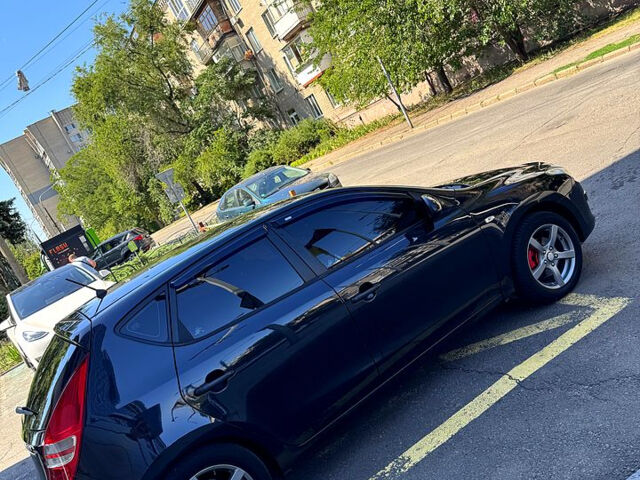 Чорний Хендай i30, об'ємом двигуна 1.6 л та пробігом 190 тис. км за 6300 $, фото 7 на Automoto.ua