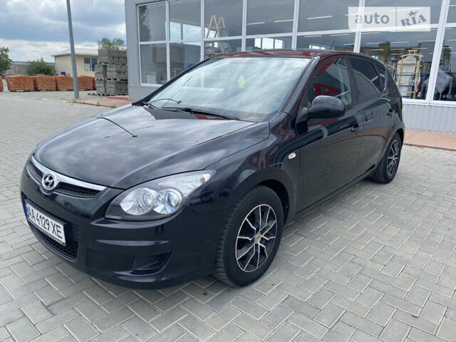 Чорний Хендай i30, об'ємом двигуна 1.4 л та пробігом 261 тис. км за 5800 $, фото 1 на Automoto.ua