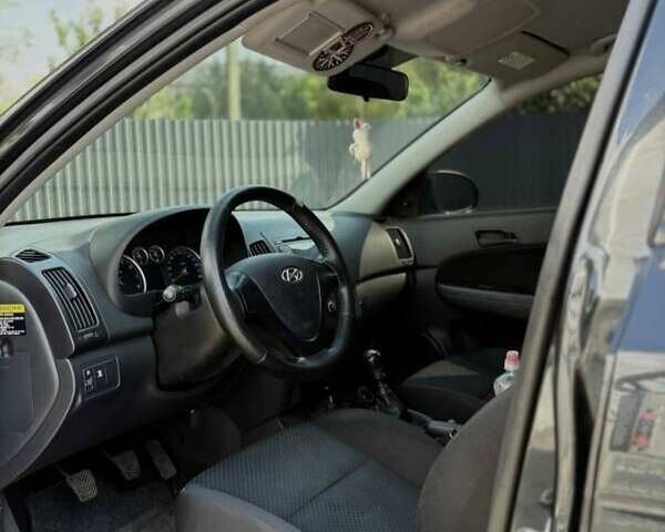 Черный Хендай i30, объемом двигателя 1.4 л и пробегом 150 тыс. км за 6600 $, фото 3 на Automoto.ua