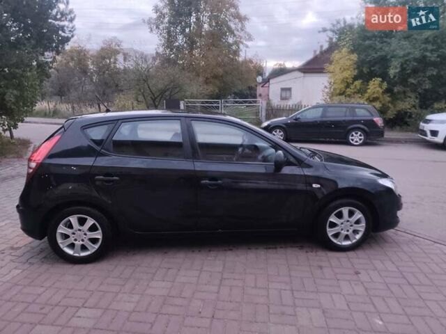 Чорний Хендай i30, об'ємом двигуна 1.4 л та пробігом 158 тис. км за 5750 $, фото 8 на Automoto.ua