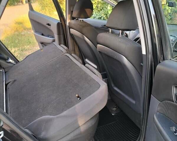 Черный Хендай i30, объемом двигателя 1.4 л и пробегом 156 тыс. км за 6500 $, фото 32 на Automoto.ua