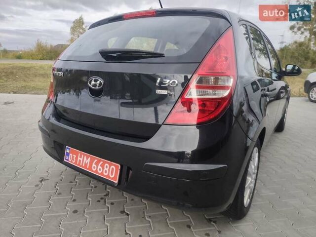 Черный Хендай i30, объемом двигателя 1.4 л и пробегом 160 тыс. км за 5999 $, фото 8 на Automoto.ua