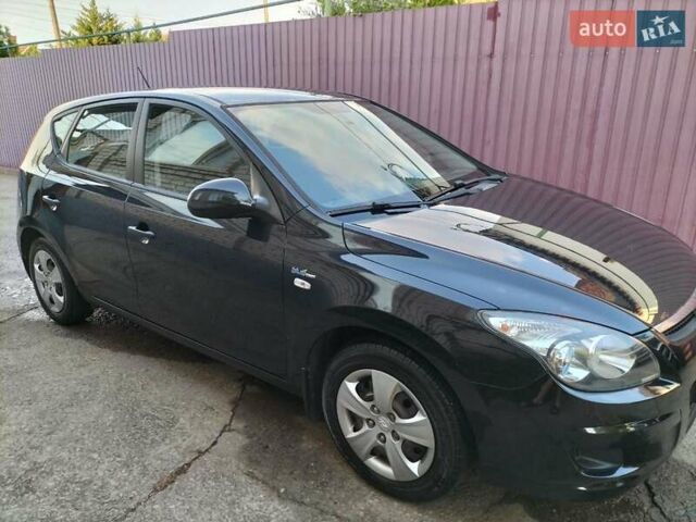 Черный Хендай i30, объемом двигателя 1.4 л и пробегом 156 тыс. км за 6500 $, фото 8 на Automoto.ua