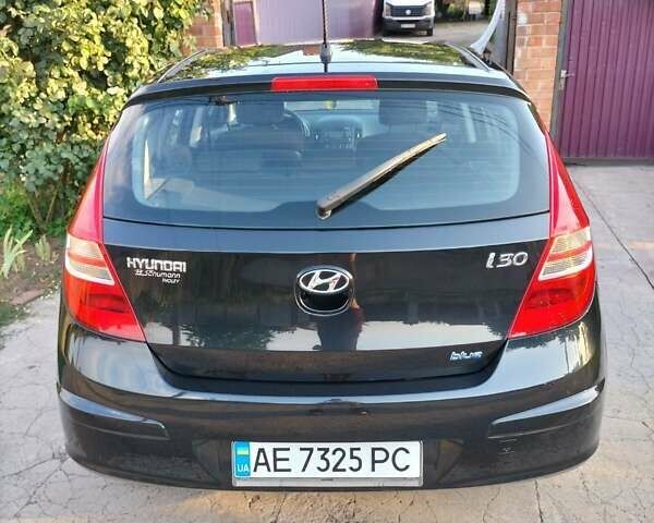 Черный Хендай i30, объемом двигателя 1.4 л и пробегом 156 тыс. км за 6500 $, фото 12 на Automoto.ua