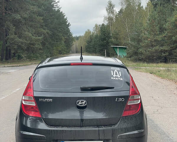Чорний Хендай i30, об'ємом двигуна 1.4 л та пробігом 223 тис. км за 5500 $, фото 2 на Automoto.ua