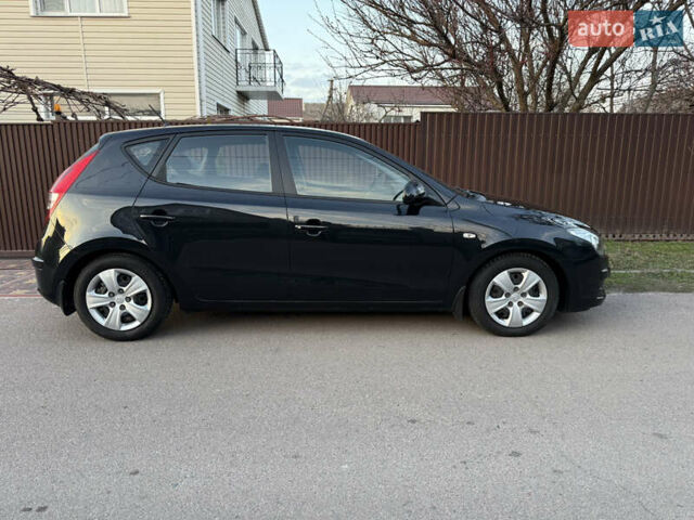 Черный Хендай i30, объемом двигателя 1.4 л и пробегом 194 тыс. км за 6350 $, фото 7 на Automoto.ua