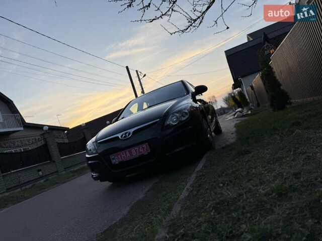 Черный Хендай i30, объемом двигателя 1.4 л и пробегом 194 тыс. км за 6350 $, фото 16 на Automoto.ua