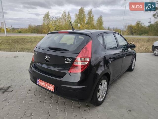Черный Хендай i30, объемом двигателя 1.4 л и пробегом 160 тыс. км за 5999 $, фото 1 на Automoto.ua