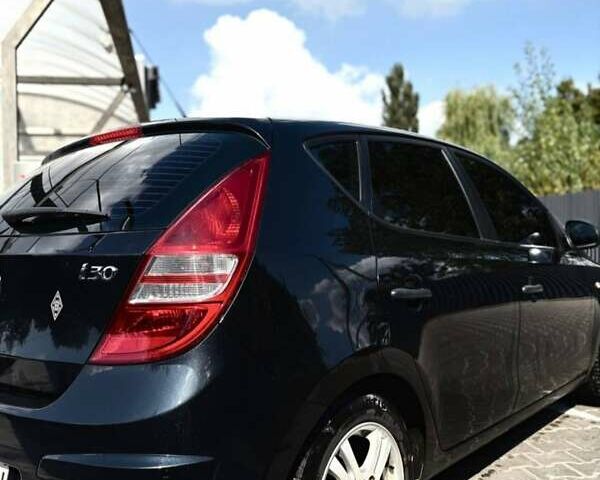 Черный Хендай i30, объемом двигателя 1.4 л и пробегом 148 тыс. км за 6650 $, фото 7 на Automoto.ua