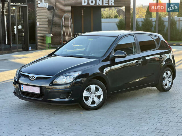 Черный Хендай i30, объемом двигателя 1.4 л и пробегом 167 тыс. км за 6299 $, фото 2 на Automoto.ua