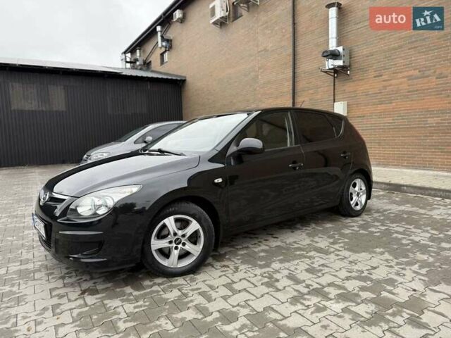 Черный Хендай i30, объемом двигателя 1.4 л и пробегом 180 тыс. км за 4990 $, фото 4 на Automoto.ua
