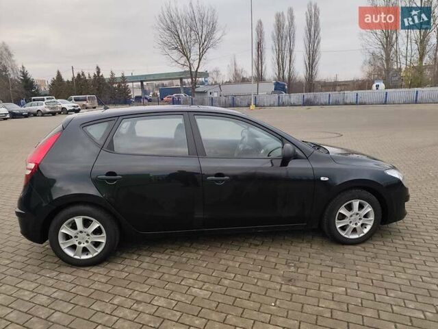 Чорний Хендай i30, об'ємом двигуна 1.4 л та пробігом 161 тис. км за 5700 $, фото 7 на Automoto.ua