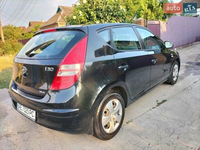 Черный Хендай i30, объемом двигателя 1.4 л и пробегом 156 тыс. км за 6500 $, фото 3 на Automoto.ua