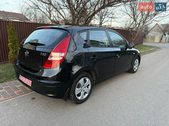 Черный Хендай i30, объемом двигателя 1.4 л и пробегом 194 тыс. км за 6350 $, фото 6 на Automoto.ua