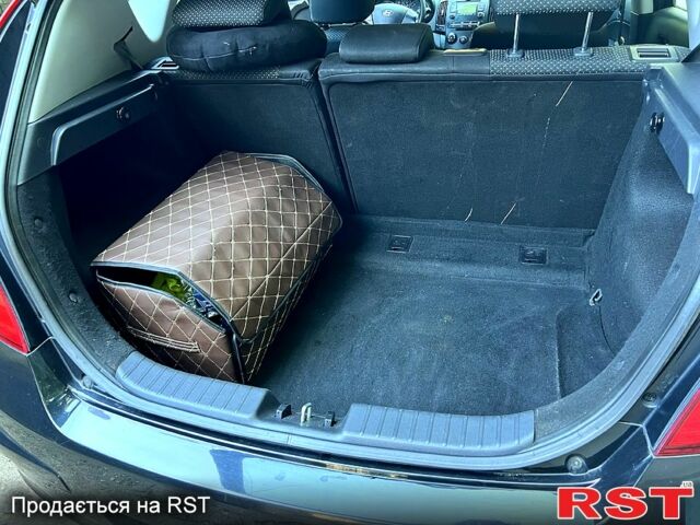 Чорний Хендай i30, об'ємом двигуна 1.6 л та пробігом 250 тис. км за 5700 $, фото 6 на Automoto.ua