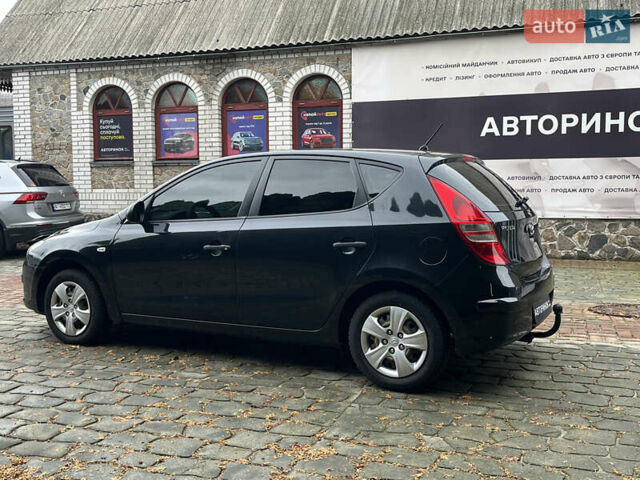 Черный Хендай i30, объемом двигателя 1.4 л и пробегом 240 тыс. км за 6000 $, фото 6 на Automoto.ua