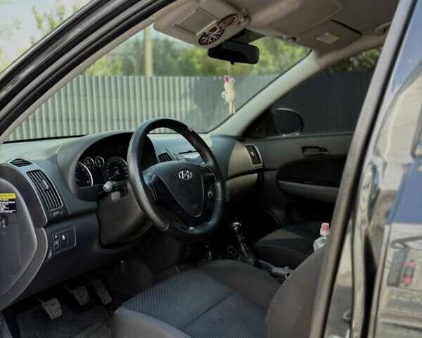 Черный Хендай i30, объемом двигателя 1.4 л и пробегом 148 тыс. км за 6650 $, фото 2 на Automoto.ua