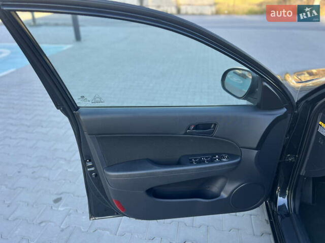 Черный Хендай i30, объемом двигателя 1.4 л и пробегом 167 тыс. км за 6299 $, фото 43 на Automoto.ua