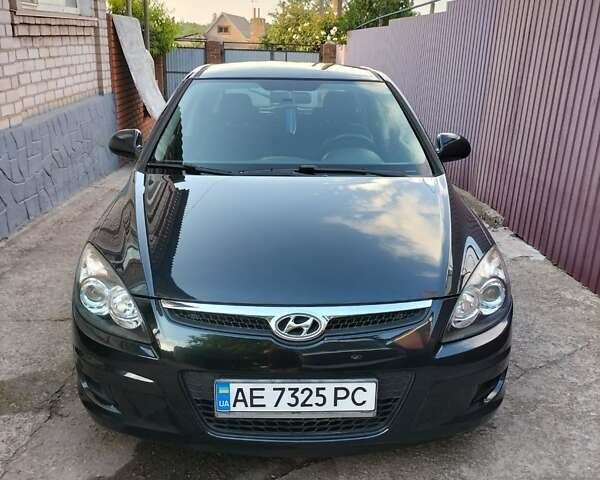Черный Хендай i30, объемом двигателя 1.4 л и пробегом 156 тыс. км за 6500 $, фото 4 на Automoto.ua