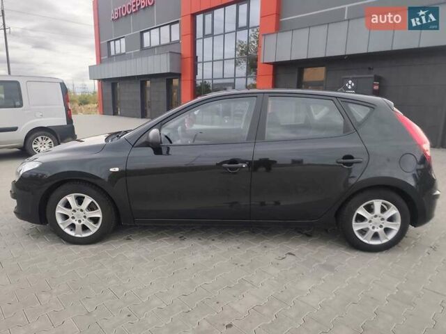 Черный Хендай i30, объемом двигателя 1.4 л и пробегом 160 тыс. км за 5999 $, фото 5 на Automoto.ua