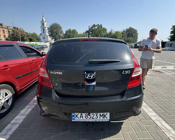 Черный Хендай i30, объемом двигателя 1.4 л и пробегом 215 тыс. км за 6000 $, фото 7 на Automoto.ua
