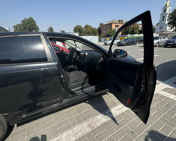 Черный Хендай i30, объемом двигателя 1.4 л и пробегом 215 тыс. км за 6000 $, фото 2 на Automoto.ua