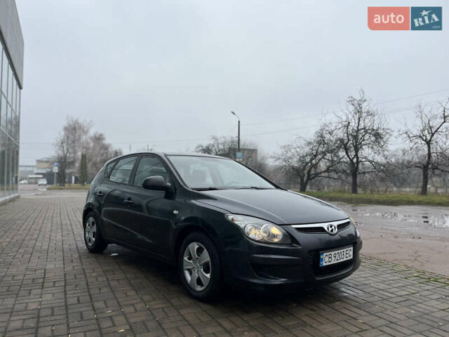 Чорний Хендай i30, об'ємом двигуна 1.4 л та пробігом 247 тис. км за 5800 $, фото 10 на Automoto.ua