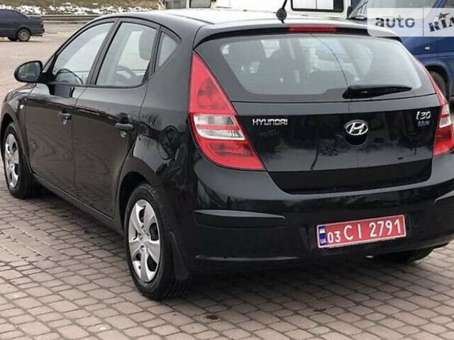 Чорний Хендай i30, об'ємом двигуна 1.6 л та пробігом 256 тис. км за 6099 $, фото 4 на Automoto.ua