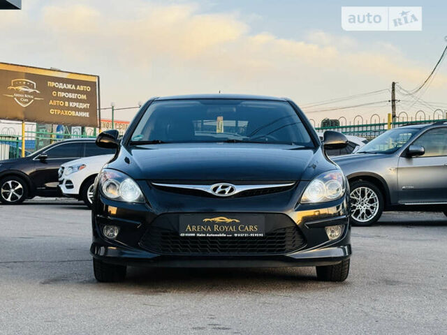 Черный Хендай i30, объемом двигателя 1.6 л и пробегом 216 тыс. км за 6700 $, фото 6 на Automoto.ua