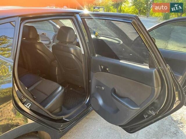 Черный Хендай i30, объемом двигателя 1.6 л и пробегом 219 тыс. км за 4700 $, фото 16 на Automoto.ua