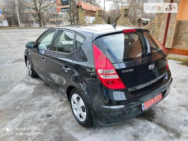 Чорний Хендай i30, об'ємом двигуна 1.4 л та пробігом 240 тис. км за 6100 $, фото 2 на Automoto.ua