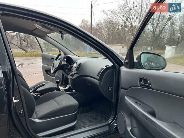 Чорний Хендай i30, об'ємом двигуна 1.4 л та пробігом 247 тис. км за 5800 $, фото 20 на Automoto.ua
