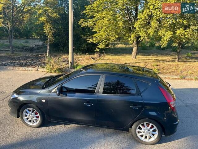 Черный Хендай i30, объемом двигателя 1.6 л и пробегом 219 тыс. км за 4700 $, фото 2 на Automoto.ua