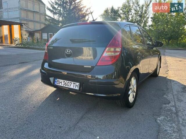 Черный Хендай i30, объемом двигателя 1.6 л и пробегом 219 тыс. км за 4700 $, фото 6 на Automoto.ua