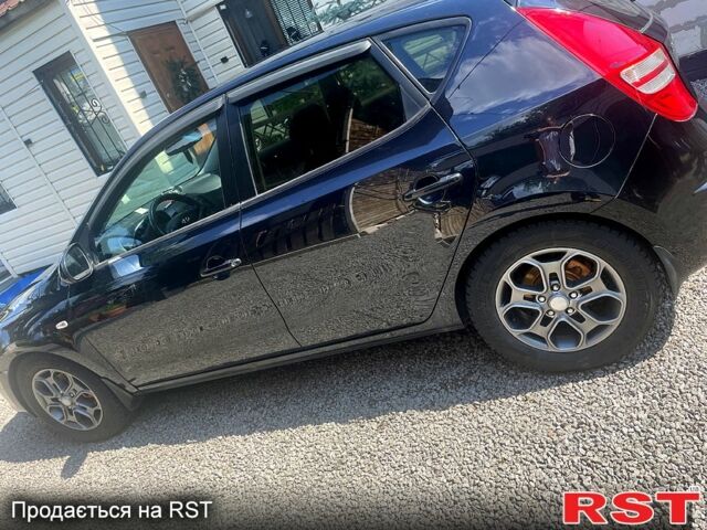 Чорний Хендай i30, об'ємом двигуна 1.6 л та пробігом 285 тис. км за 6400 $, фото 6 на Automoto.ua