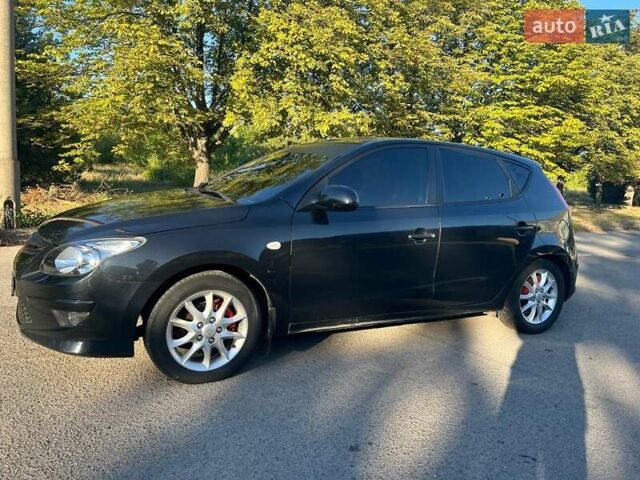 Черный Хендай i30, объемом двигателя 1.6 л и пробегом 219 тыс. км за 4700 $, фото 1 на Automoto.ua