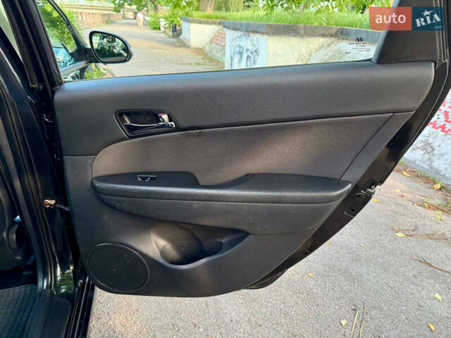 Черный Хендай i30, объемом двигателя 1.6 л и пробегом 198 тыс. км за 6600 $, фото 22 на Automoto.ua