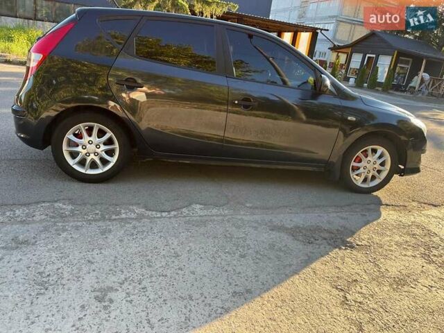 Черный Хендай i30, объемом двигателя 1.6 л и пробегом 219 тыс. км за 4700 $, фото 8 на Automoto.ua