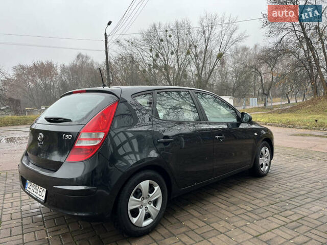 Чорний Хендай i30, об'ємом двигуна 1.4 л та пробігом 247 тис. км за 5800 $, фото 6 на Automoto.ua