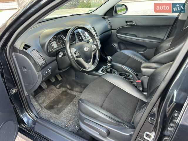 Чорний Хендай i30, об'ємом двигуна 1.4 л та пробігом 248 тис. км за 6950 $, фото 29 на Automoto.ua