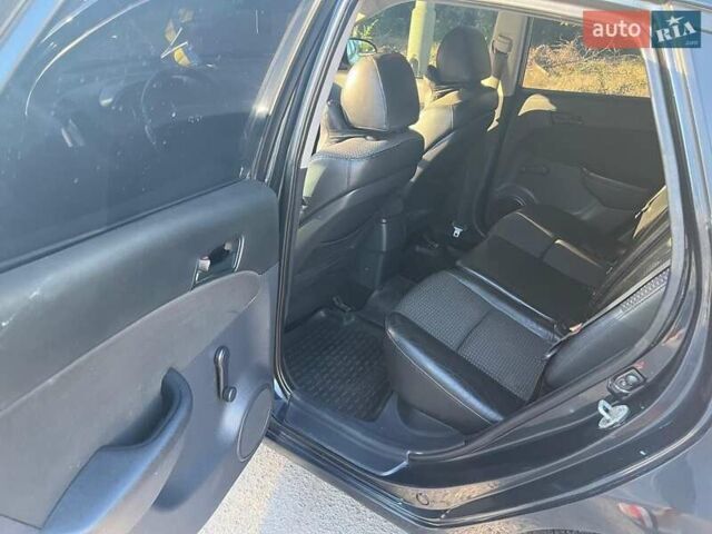 Черный Хендай i30, объемом двигателя 1.6 л и пробегом 219 тыс. км за 4700 $, фото 15 на Automoto.ua