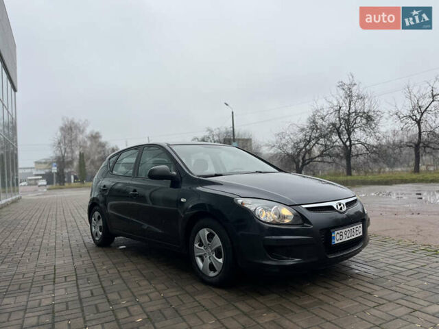 Чорний Хендай i30, об'ємом двигуна 1.4 л та пробігом 247 тис. км за 5800 $, фото 9 на Automoto.ua