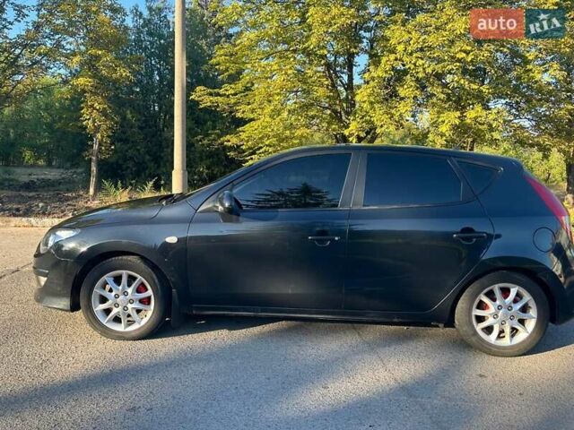 Черный Хендай i30, объемом двигателя 1.6 л и пробегом 219 тыс. км за 4700 $, фото 3 на Automoto.ua