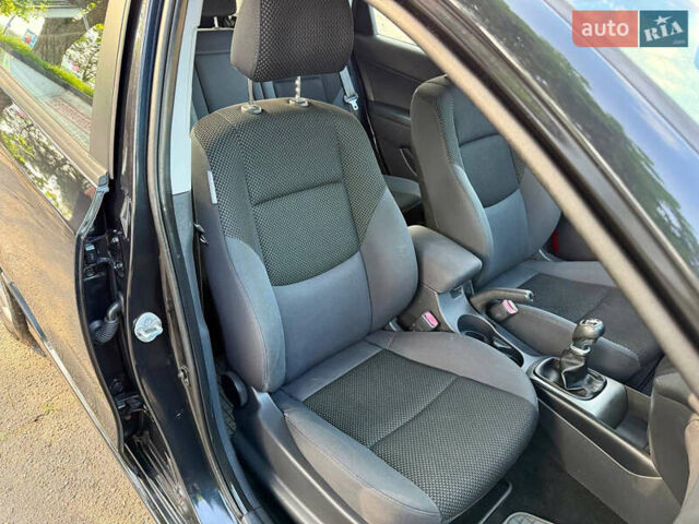 Черный Хендай i30, объемом двигателя 1.6 л и пробегом 198 тыс. км за 6600 $, фото 23 на Automoto.ua