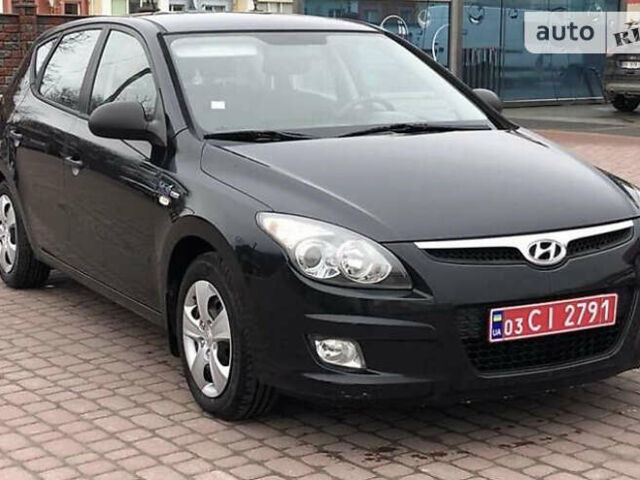 Чорний Хендай i30, об'ємом двигуна 1.6 л та пробігом 256 тис. км за 6099 $, фото 2 на Automoto.ua