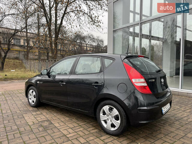 Чорний Хендай i30, об'ємом двигуна 1.4 л та пробігом 247 тис. км за 5800 $, фото 2 на Automoto.ua