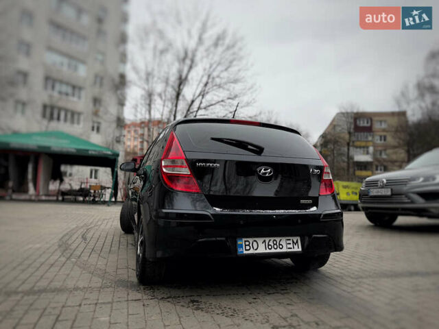 Черный Хендай i30, объемом двигателя 1.58 л и пробегом 215 тыс. км за 7500 $, фото 2 на Automoto.ua