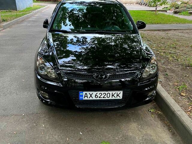 Чорний Хендай i30, об'ємом двигуна 1.4 л та пробігом 200 тис. км за 7800 $, фото 9 на Automoto.ua