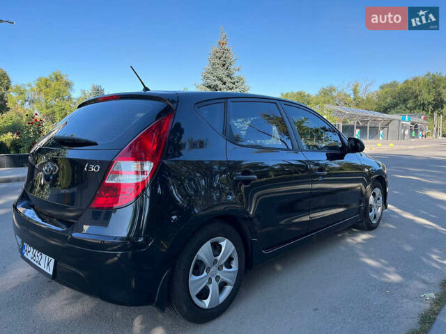 Черный Хендай i30, объемом двигателя 1.4 л и пробегом 230 тыс. км за 6200 $, фото 3 на Automoto.ua