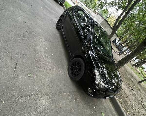 Черный Хендай i30, объемом двигателя 1.4 л и пробегом 223 тыс. км за 6500 $, фото 6 на Automoto.ua